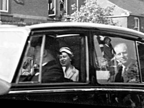 Queen Elizabeth II being driven through Hagley